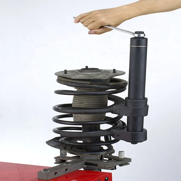 

Auto repair macpherson strut coil spring compressor