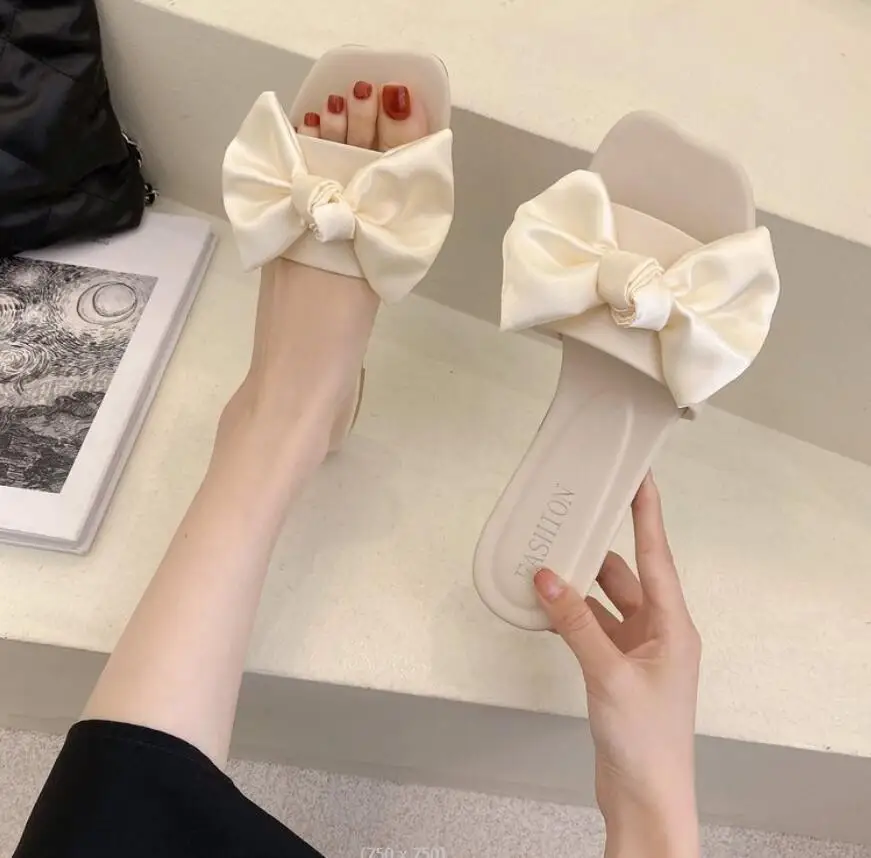 Летние женские тапочки на плоской подошве с бантом-бабочкой слитные удобная