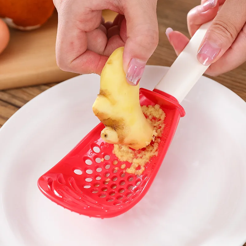 

Ultimate Kitchen Gadget: Multifunctional Filter Colander, Grinding Spoon, Ginger Garlic Press, Silicone Egg White Separator - A