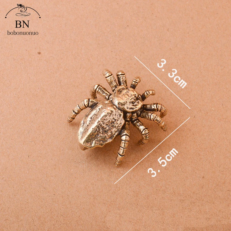 

Миниатюрные медные фигурки паука тарантула