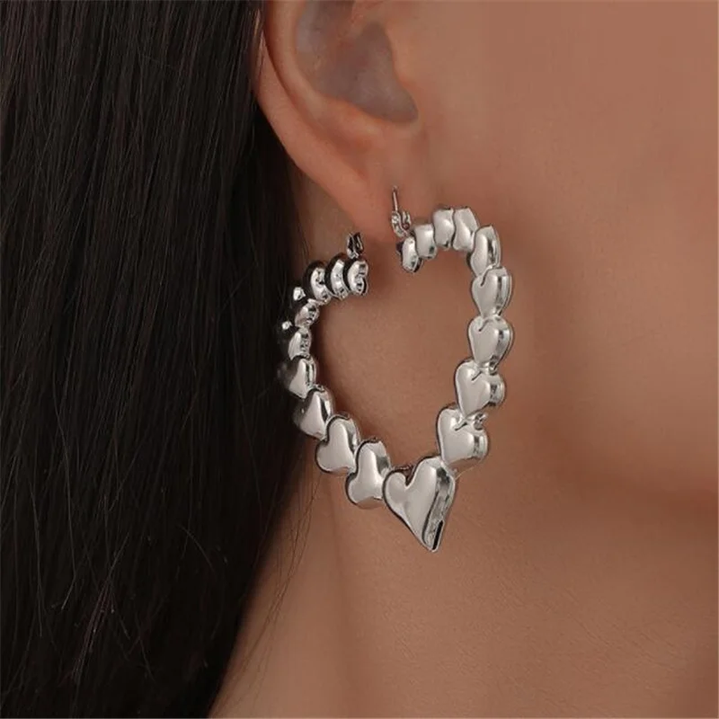 

Creative Exaggerated Metal Hollow Out Heart Shape Earrings Gold And Silver Color Earrings European And American Women's Jewelry