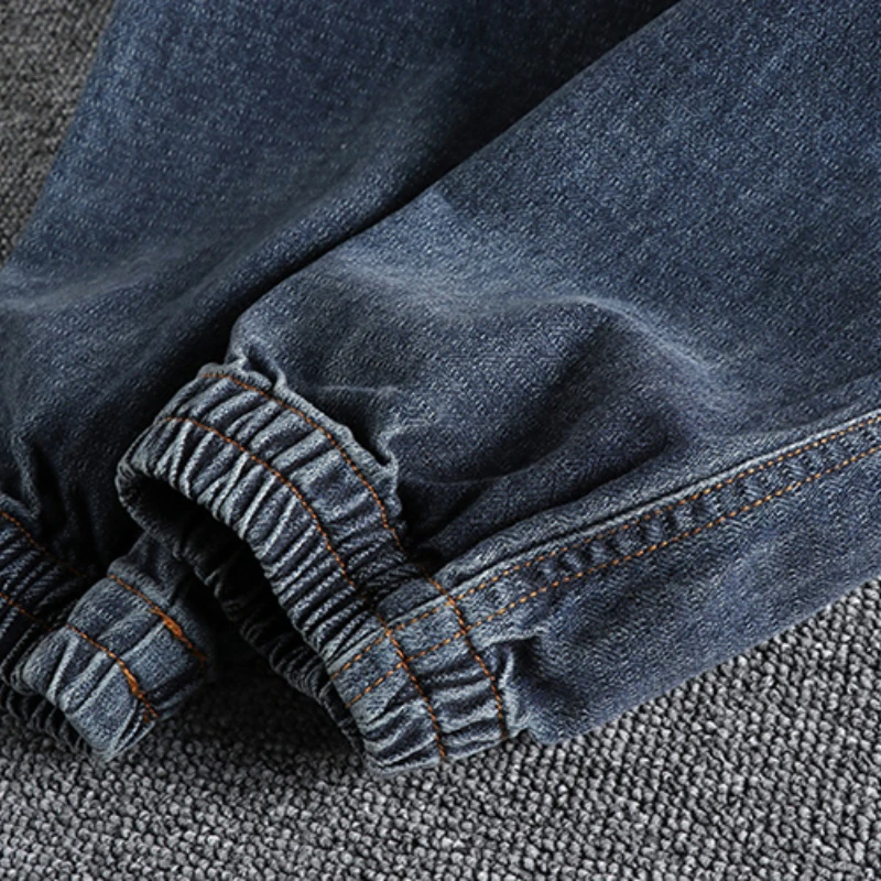 Simple retro motorcycle Feng Shui washed old Jacquard jeans, men's fitted leggings and joker youth long pants.