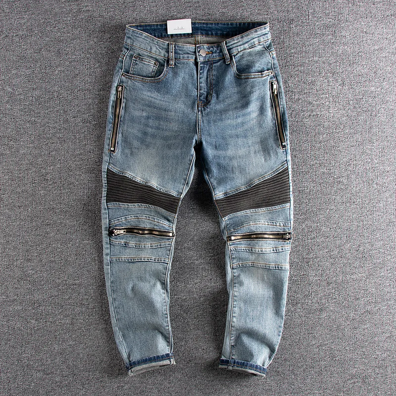 

Splicing zipper hole stereo cutting men's jeans light blue retro trend slim little feet youth nine minutes pants.