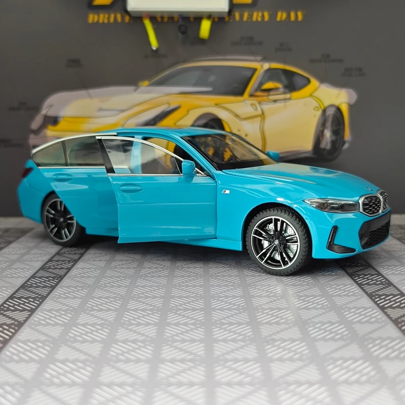 Фото Модель автомобиля BMW 325li из сплава, масштаб 1/24, с открывающимися дверями с обеих сторон, а также с открывающимися передним капотом и дверцей багажника. №4