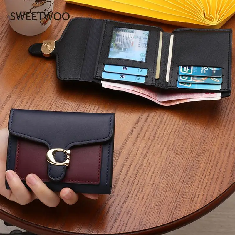 

Женский кошелек из искусственной кожи с отделениями для монет