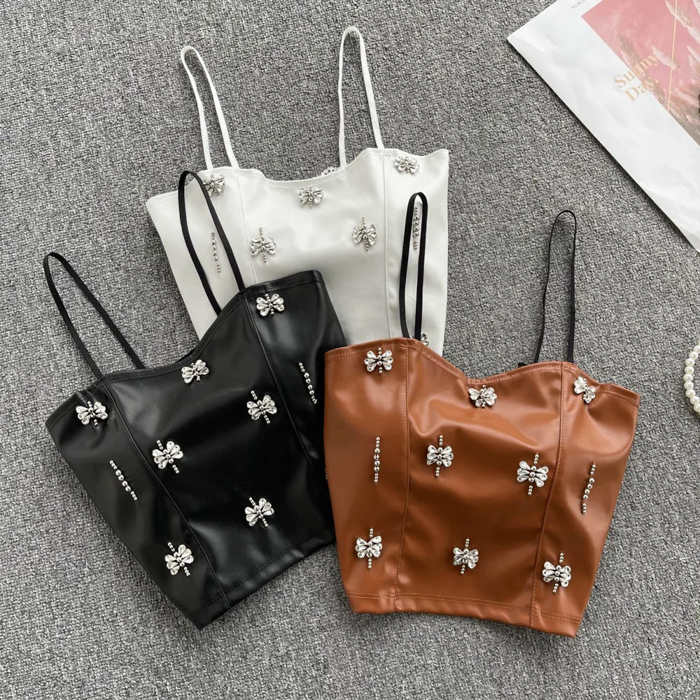 

Net Red with the New Spring 2022 Xiaoxiang Feng Shui Drop Drill Nail Bead Backed Breast Pad PU Leather Suspender Vest for Women