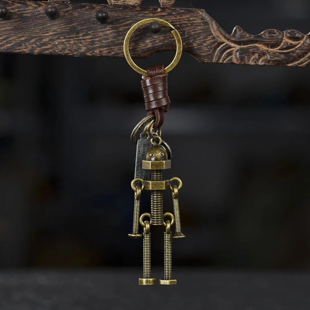 Accessories retro male and female lovers cowhide key chain with movable hands and feet creative robot Keychain