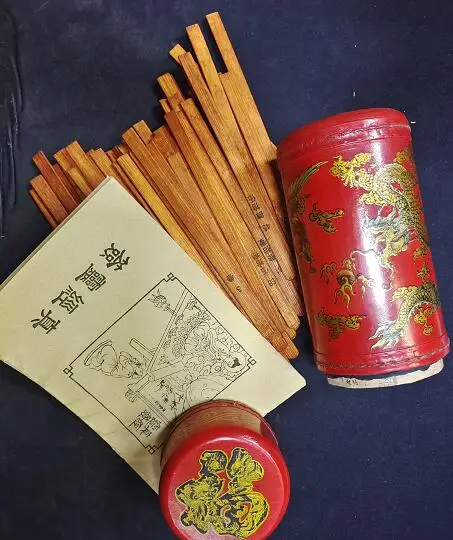 

Chinese Fortune Sticks In Red Leather Case Bamboo stick divination