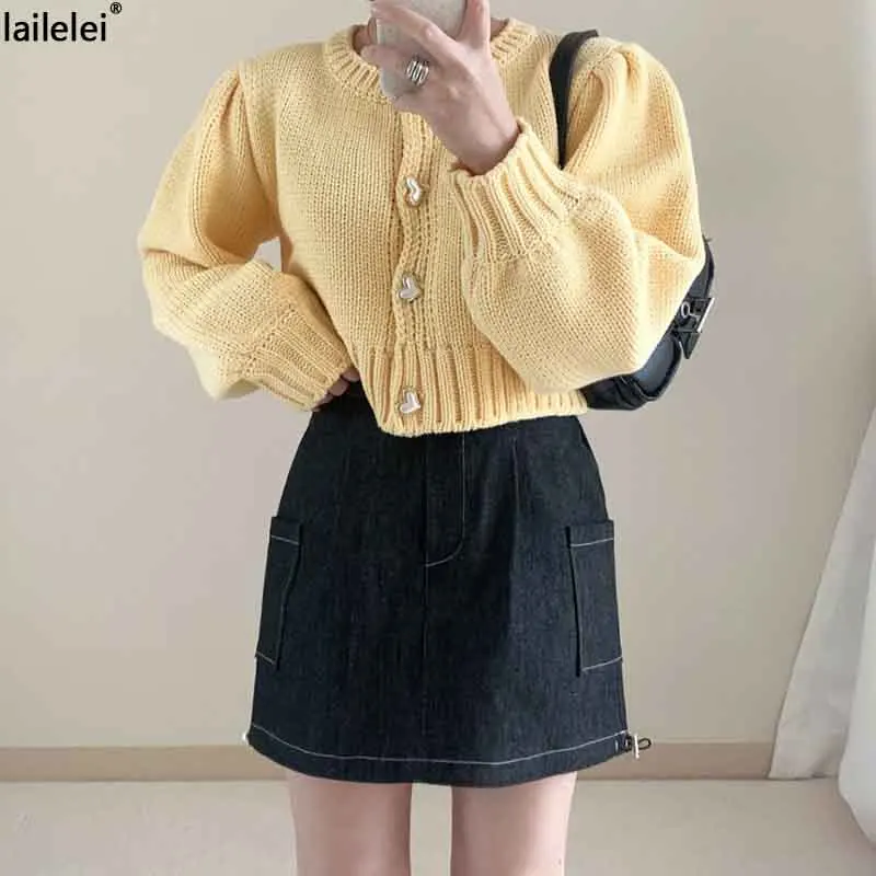 

Delicate heart button puff sleeve knitted jacket