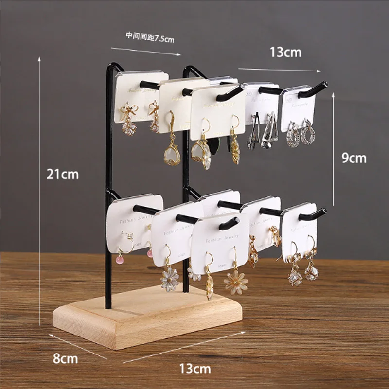

Деревянная стальная подставка для сережек Rasalhaguer