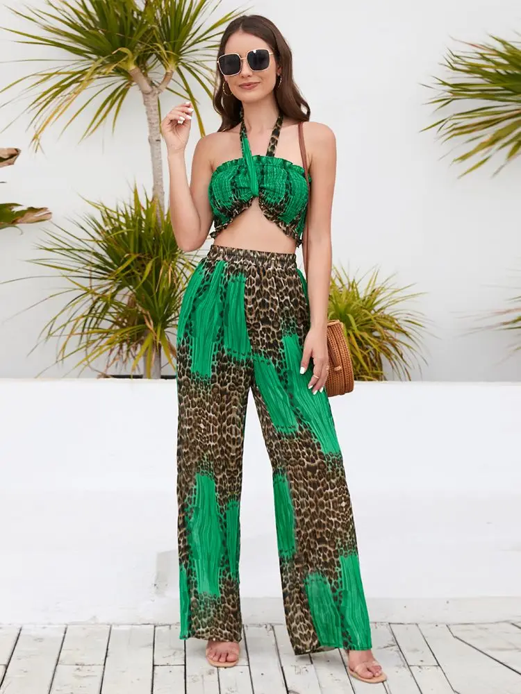

Женский брючный костюм с леопардовым принтом, летний костюм из полиэстера без бретелек и плиссированных коротких топов с широкими штанинам...