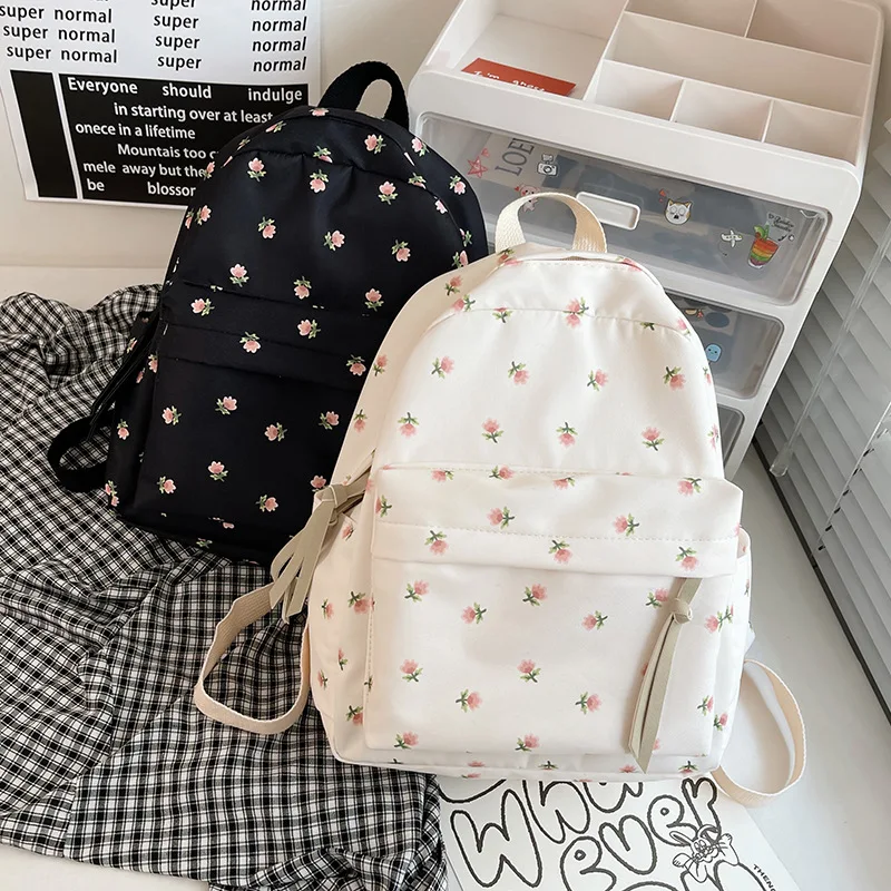 

Small fresh print literary student schoolbag 2022 spring new Korean version of the backpack for junior high school students