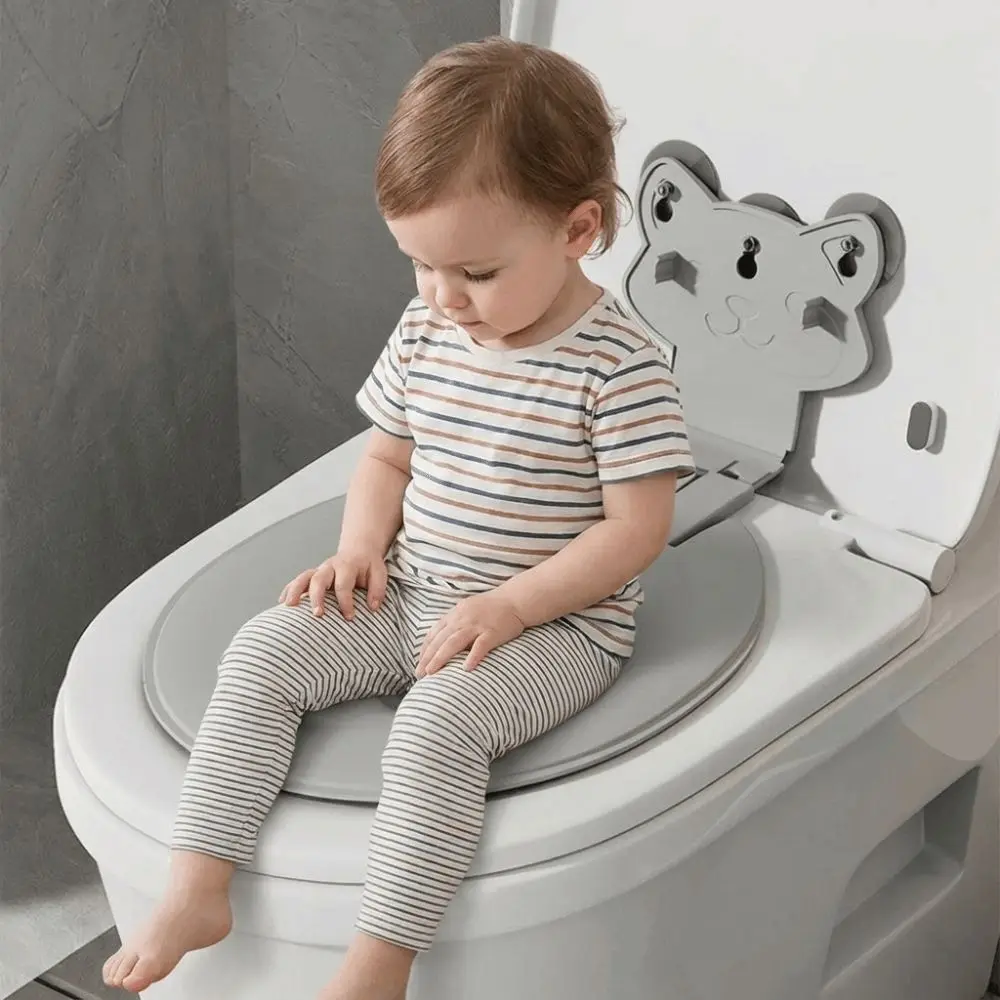 Фото Универсальное складное сиденье для унитаза с креплением на присосках, водонепроницаемое, портативное, милое, регулируемое, с подушкой-кольцом №3