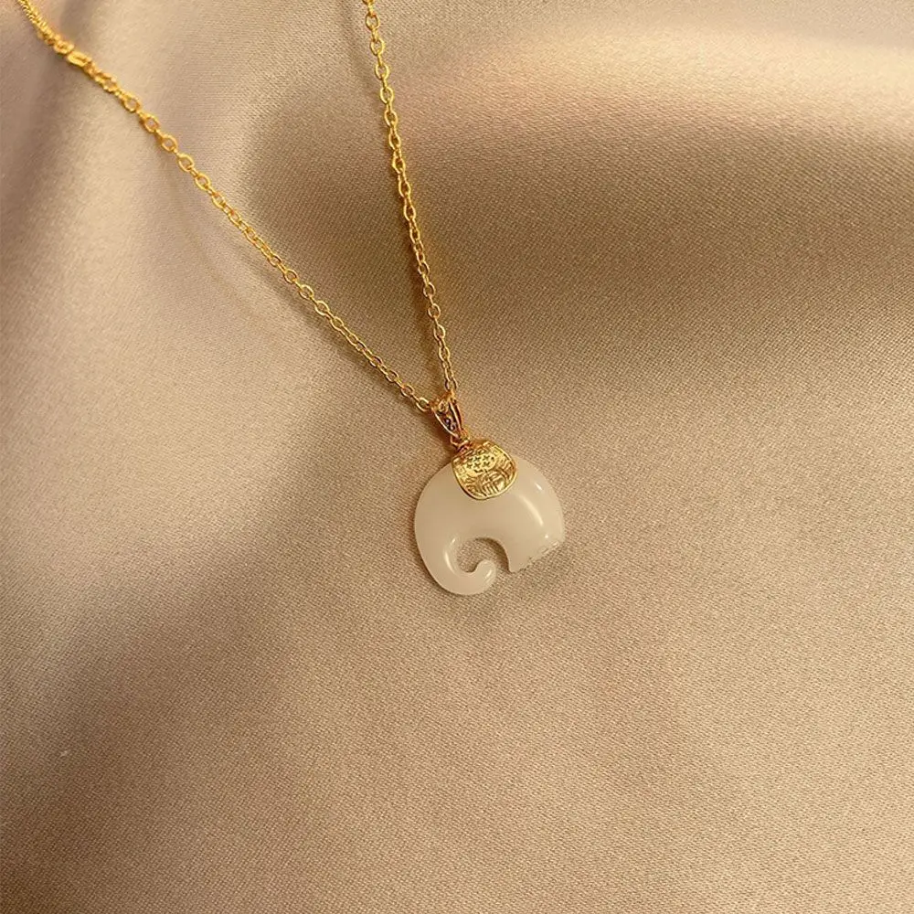 Женская цепочка золотого цвета с подвеской в виде слона | Ожерелья