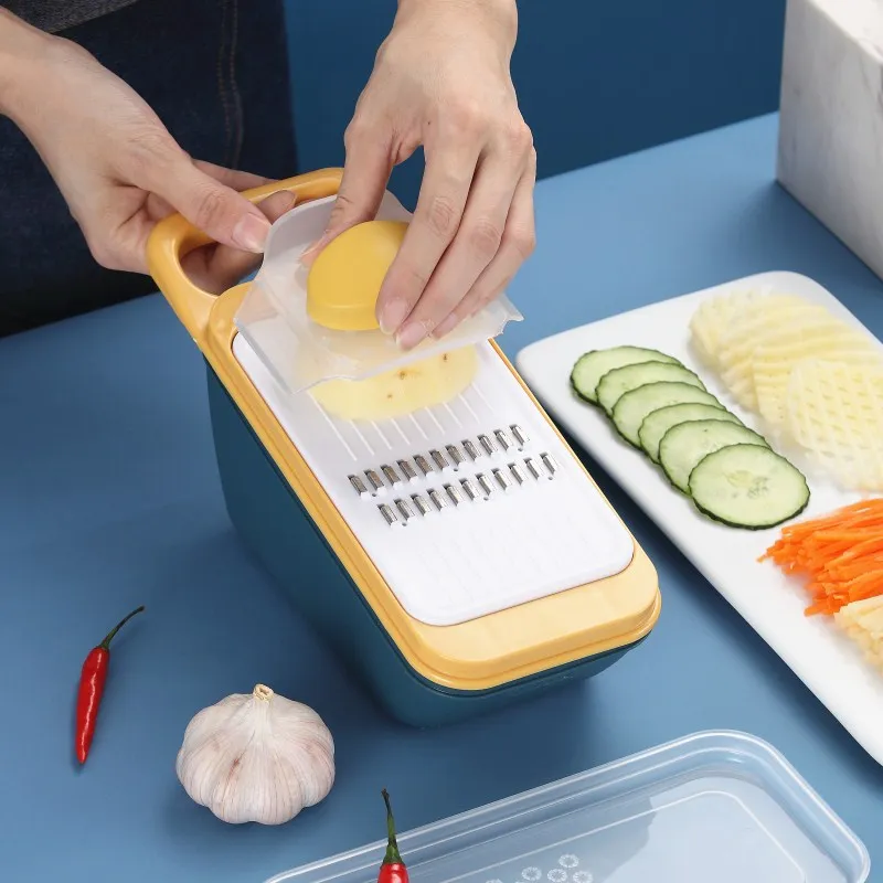 

Кухонный прибор для измельчения фруктов и овощей