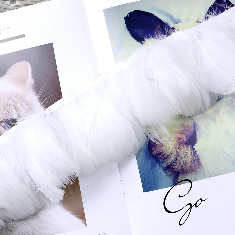 

Natural Feathers 1 Meter White Goose Feather Ribbons for Crafts Height 8-12CM Wedding Dress Clothing Sewing Accessories