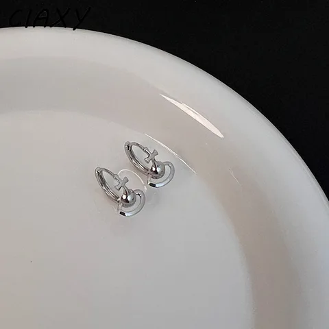 Серебряные серьги-гвоздики "Сатурн"  ciaxy