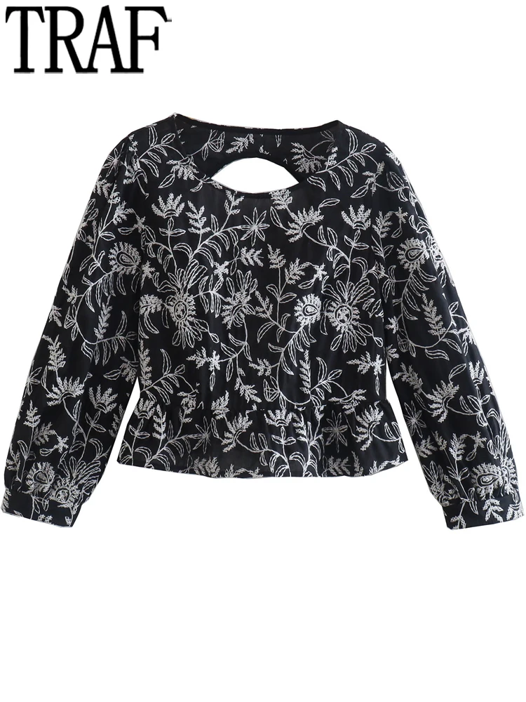 

Блузка с вышивкой и открытой спиной, с воланом и длинным рукавом