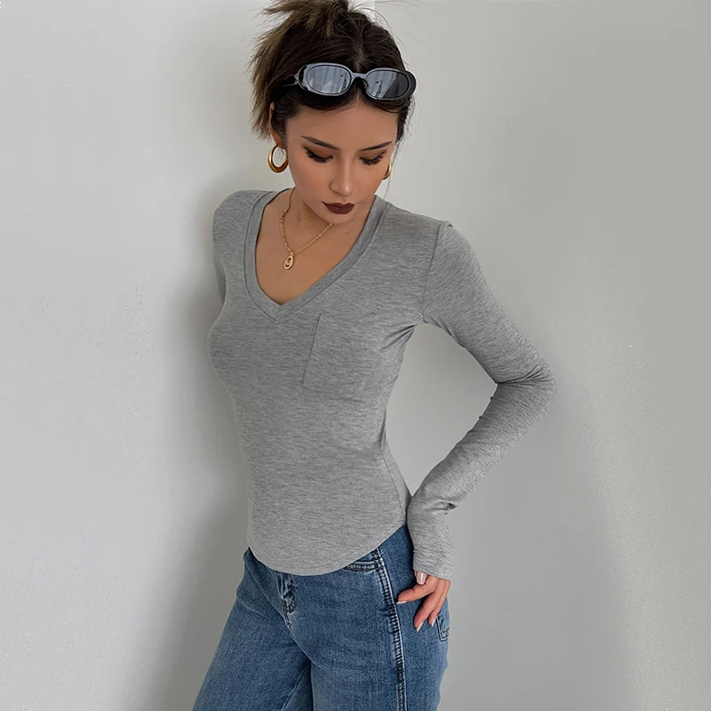 

Women V Neck Long Sleeved Crop Top With Pocket Detail