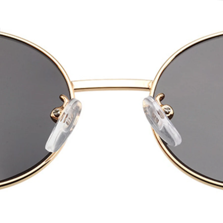 Очки солнцезащитные женские в металлической овальной оправе винтажные