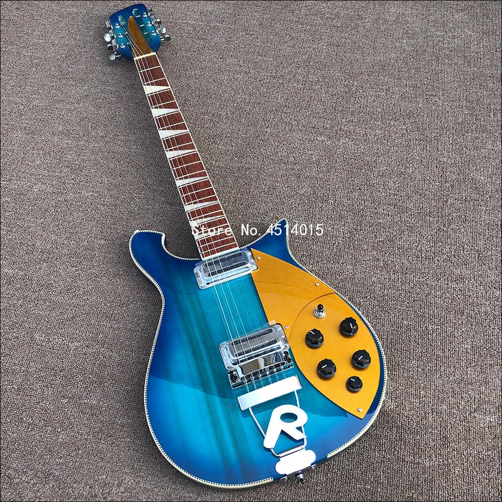 

Высококачественная 6-струнная электрическая гитара Rickon 660. Синяя краска, шея через тело, золотой крыло, почтовые расходы.