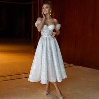 glitter bridal gown puff sleeves sweetheart tea length sparkly wedding gown white a line bow backless short wedding dress 2022