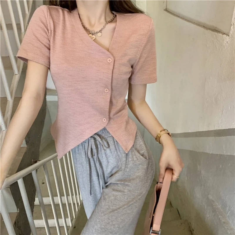 

2022 summer net red design sense of minority solid color diagonal short sleeve top women's irregular careful machine cardigan