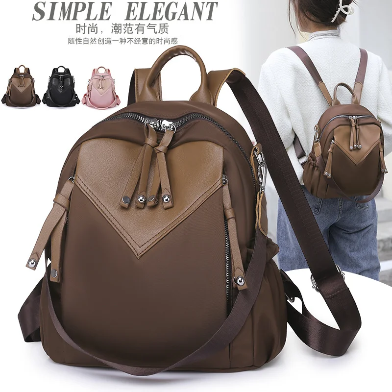 Backpack Women's new lightweight compact large capacity travel backpack lightweight splash-proof student bag messenger bag