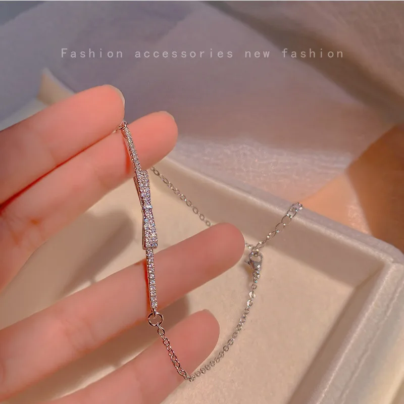 

Inlaid Zircon Bow Bracelet Women Simple Unique Design Hand Jewelry Stainless Steel Chain Wedding Jewelry Birthday Present