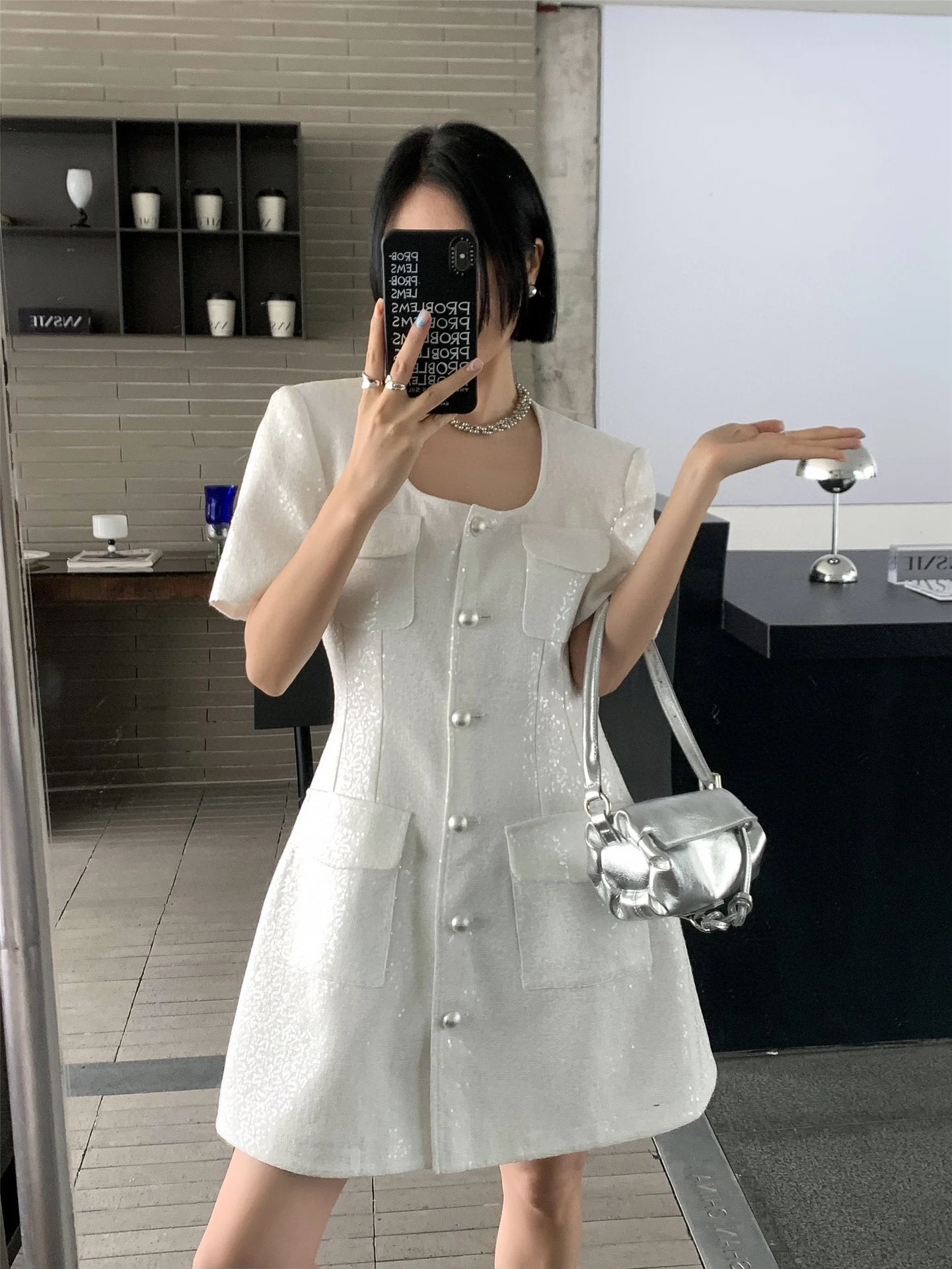 

2023 spring and summer women's clothing fashion new Pearl Buckle Sequins Dress 0504