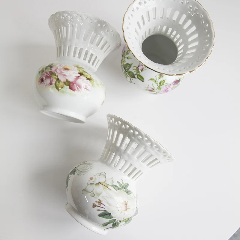 European style export ceramic applique round bellied vase with hollow edge design
