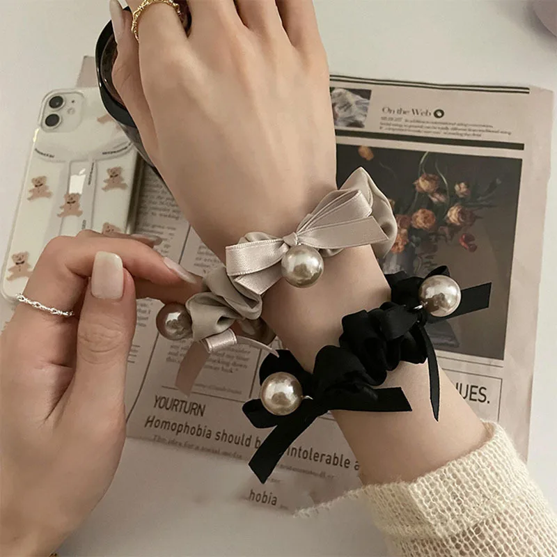 

Korean Style Pearl Bows Hair Scrunchies For Women Girls Elastic Hair Bands Ties Rope Bands Ponytail Bands Hair Accessories New