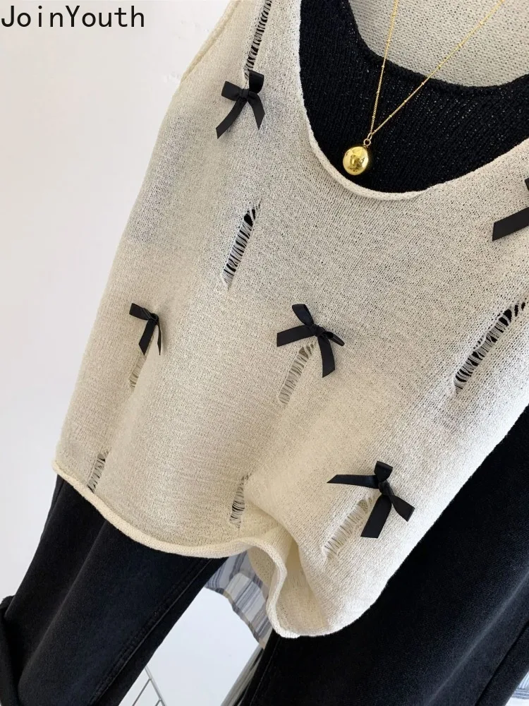 Топ женский трикотажный с бантом без рукавов свободного покроя