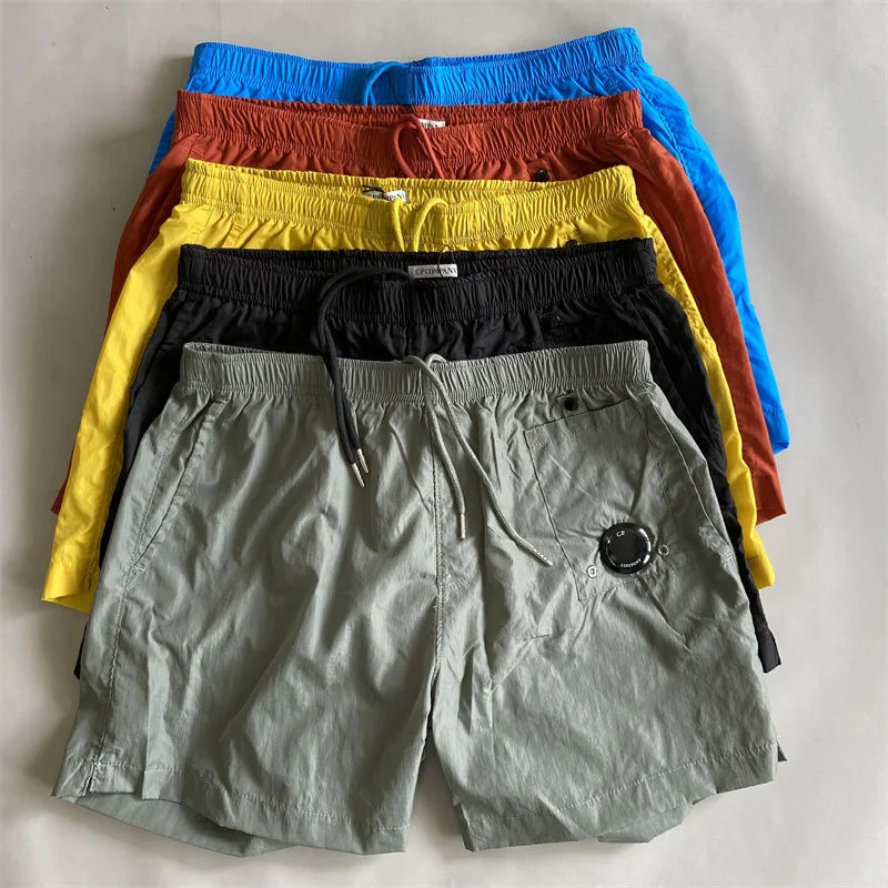 

Summer C P New Men's Shorts Youth Outdoor Casual Solid Color Sports Nylon Shorts Loose Casual Men's Beach Pants 5-point Pants
