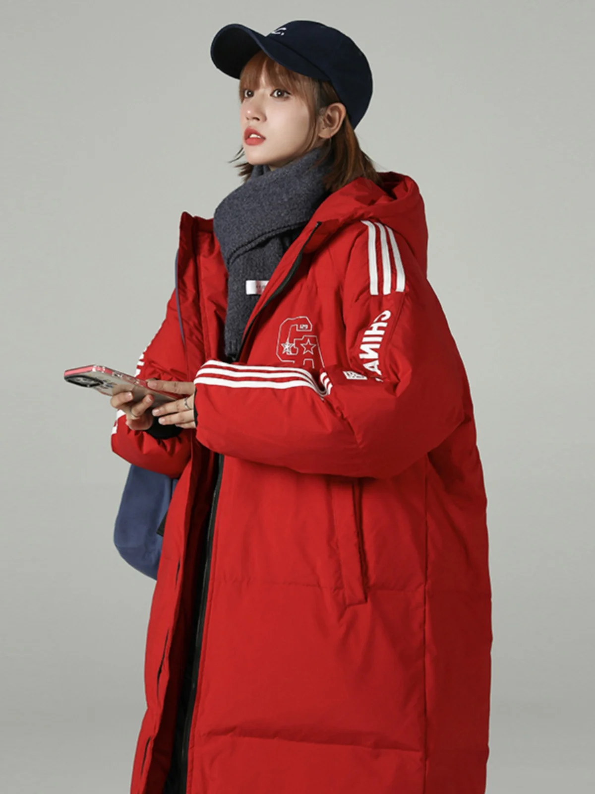 Зимний большой стеганый пуховик женский средней длины выше колена утолщенный