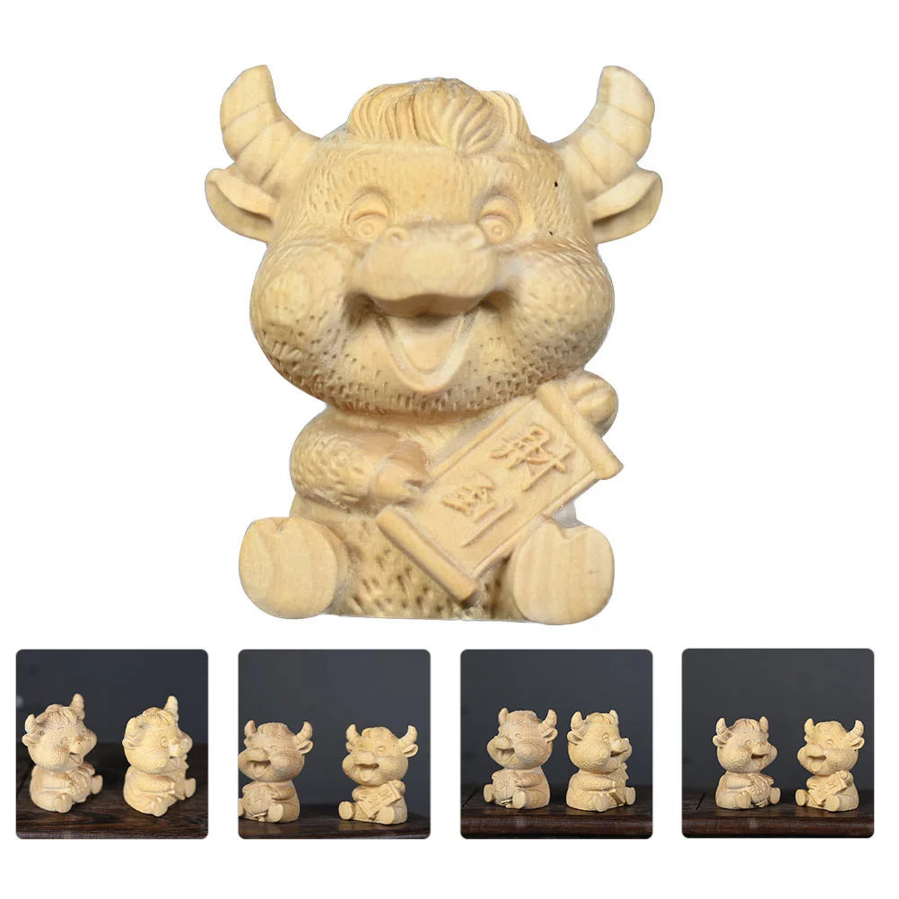 

Boxwood Carved Tea Pet Wooden Carved Cow Statue Desktop Ox Figurine Decoration