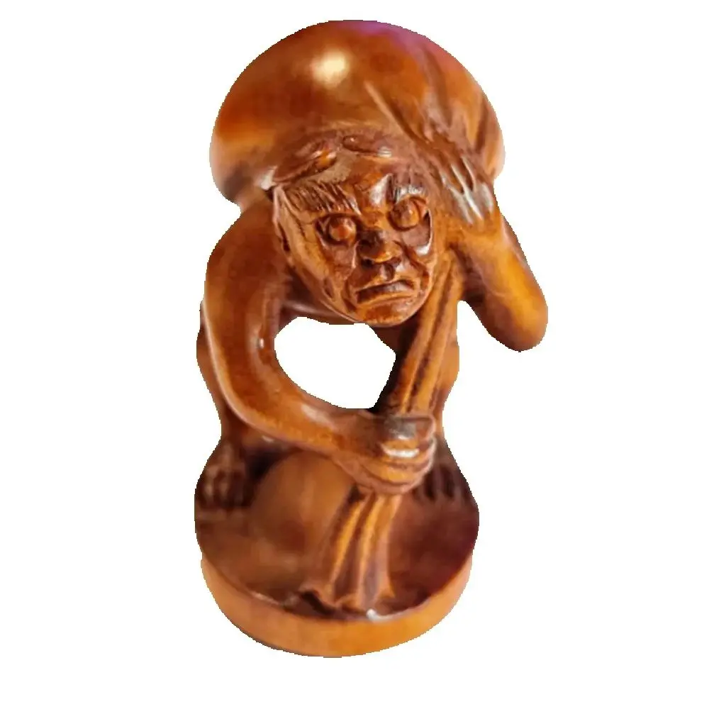 

Миниатюрная скульптура из самшита Они Человек