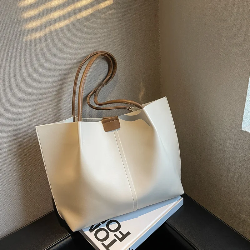 

Женская дизайнерская сумка из искусственной кожи, однотонная, на застежке