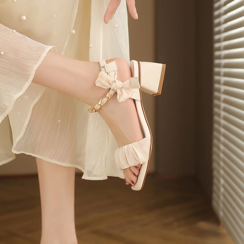 

2022 new women's shoes Korean version of the simple limelight layer cowhide square toe silk bow mid-heel sandals