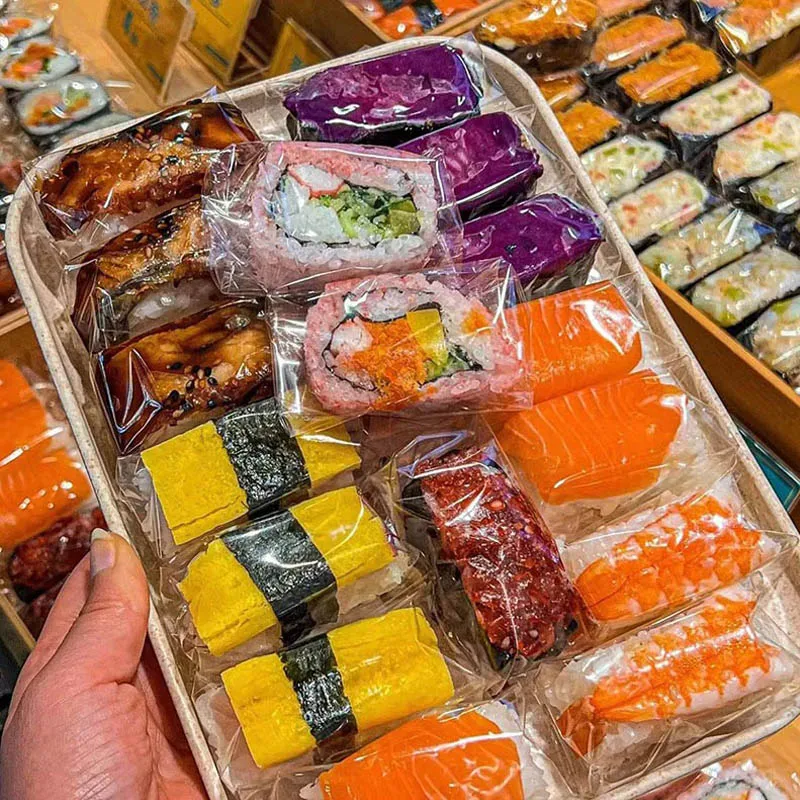 

1000pcs Sushi Plastic Film Transparent Clear Cellophane Rice Ball Packing Sheet Paper Food Wrapper
