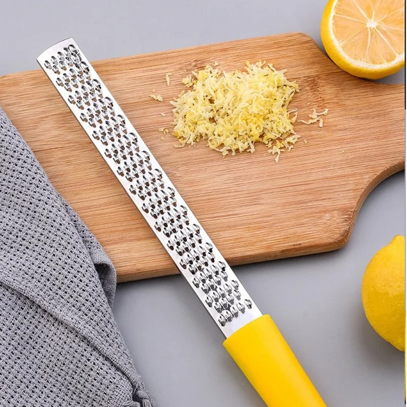 

Multifunctional Lemon Grater Kitchen Home Stainless Steel Cheese Grater Fruit Vegetable Grater with Non-Slip Handle Fatiador