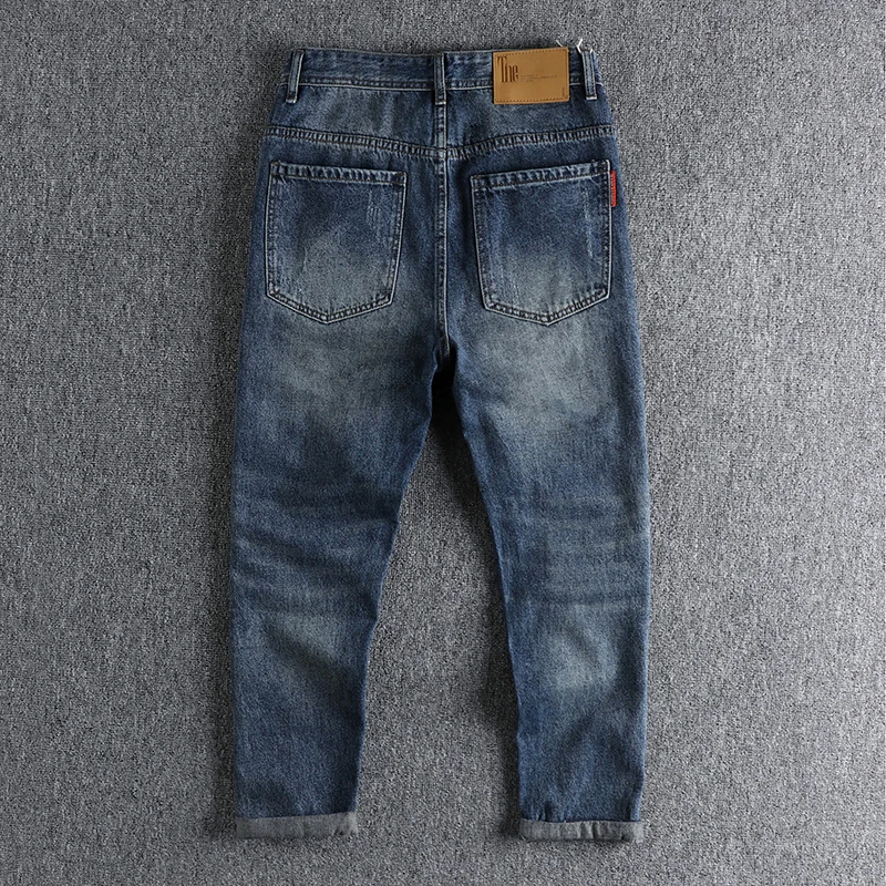 Heavy craft washing in autumn and winter makes old ripped jeans, men's loose straight trend youth harem pants nine points