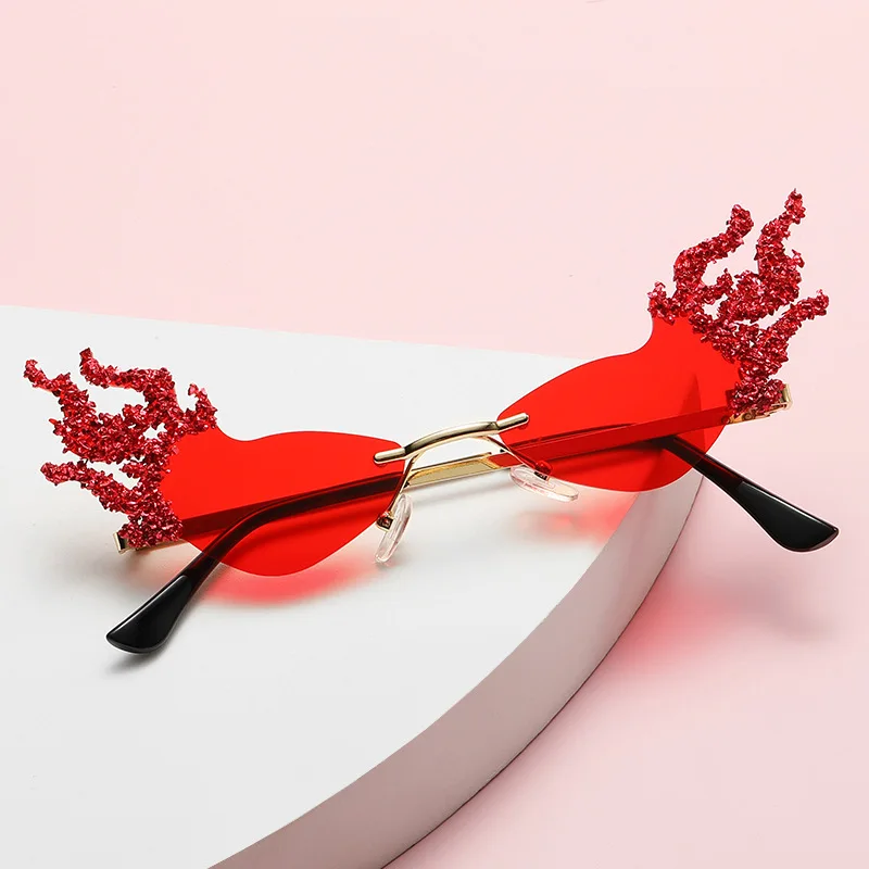 

Fashion Fire Flame Sunglasses for Women Men Rimless Cat Eye UV400 Sun Glasses Luxury Hollow Shades Streetwear Eyewear