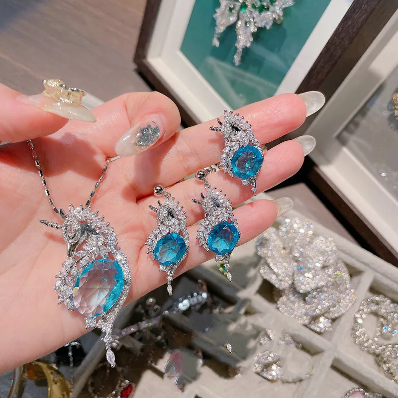 

2022 New Creative Unicorn Jewelry Dazzling Sea Blue Zircon Crystal Animal Jewelry Set for Women Ring Earring Necklace Chain