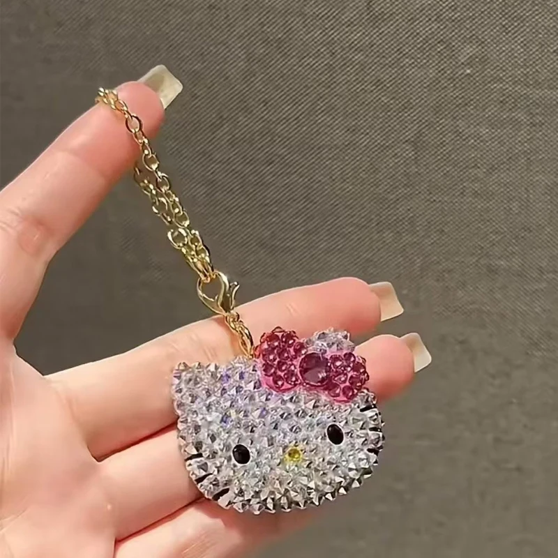 

Мини брелок Hello Kitty из металла MINISO