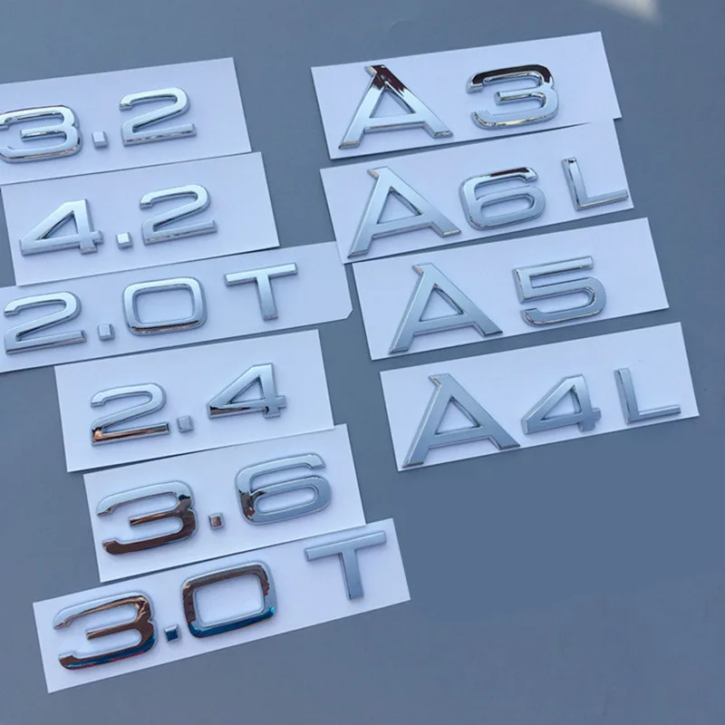 

Silver Chrome Emblem for Audi 1.8T 2.0T 2.4 3.0T 3.2 3.6 A3 A4 A5 A6L A7 A8L Q3 Q5 Q7 Four Wheel Drive Car Trunk Logo Sticker
