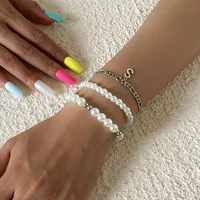 imitation pearl bracelet european and american retro cold wind splicing letter hollowed out chain ornament