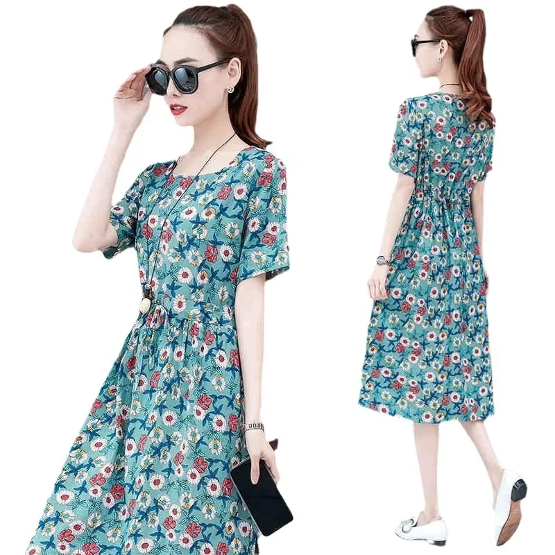 Элегантное женское утягивающее платье средней длины с цветочным принтом на