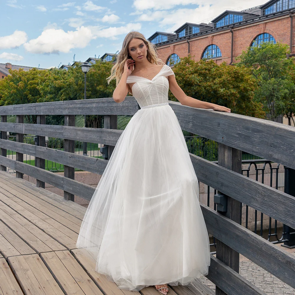 

Elegant Tulle Wedding Dresses Jewel Neck Cap Sleeves Bridal Gowns Pearls Beads Pleat Sweep Train A-line Robe De Mariee 2023