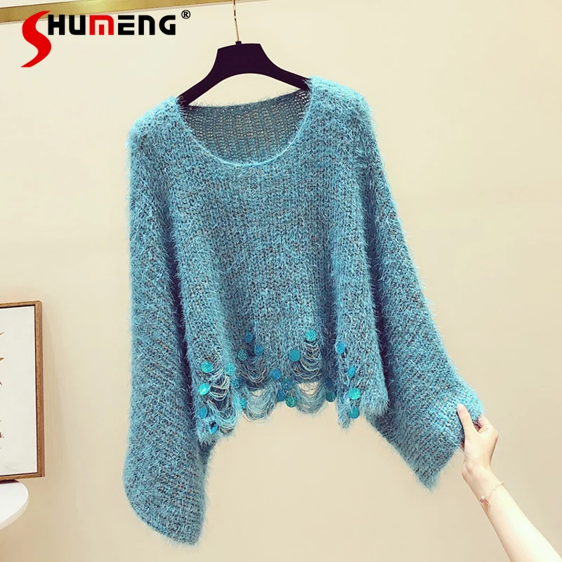 

Женский мохеровый свитер с рукавами «летучая мышь» и круглым вырезом